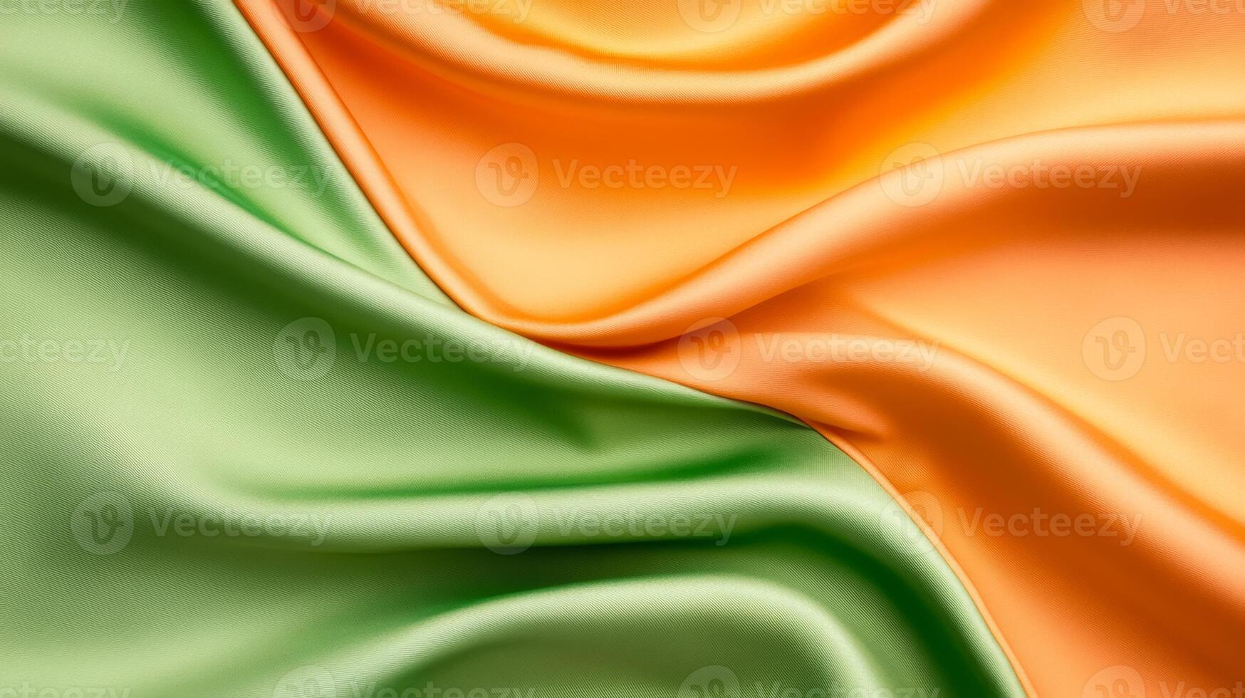 Soft orange and green satin with gentle ripples evoking Ugadi celebration warm and inviting abstract background for South Indian New Year traditions photo