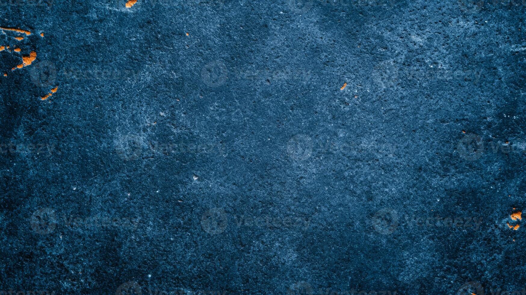 Distressed stone surface in dark blue with white and orange accents for International Astronomy Day grainy texture with scattered star like patterns and subtle celestial vibes photo