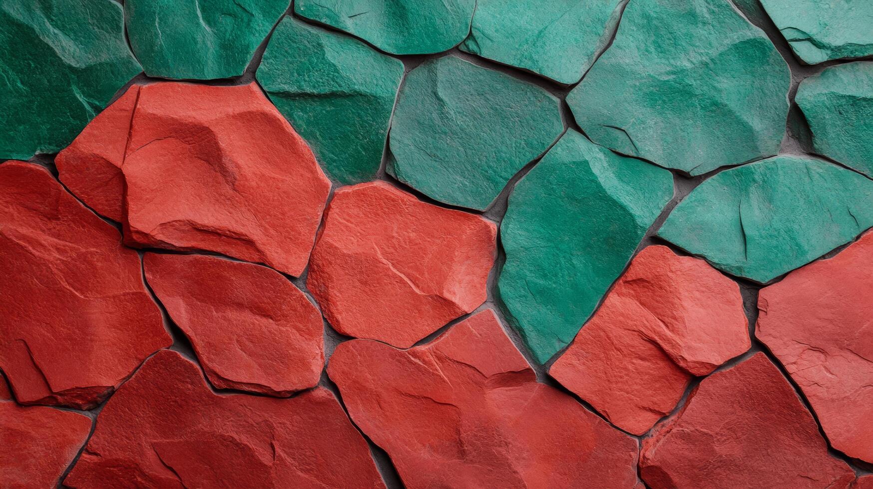 Rough grainy stone wall texture with deep red and emerald green tones reflecting Christmas holiday spirit subtle gradient shadows and cracks add depth and a rustic feel photo