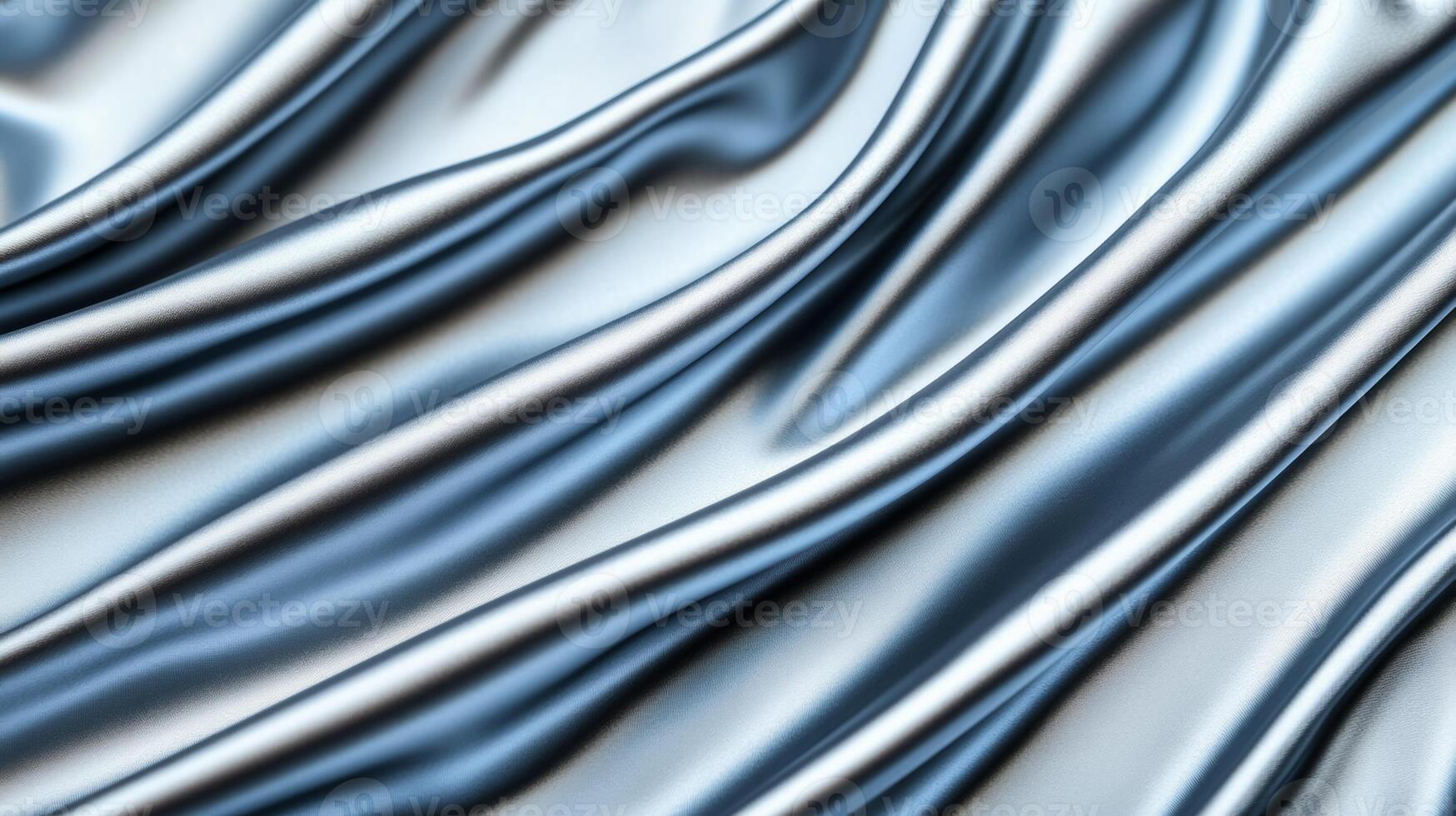 Silver silk fabric with smooth folds and icy blue highlights flowing softly elegant abstract background for winter holidays or New Years Eve cool and luxurious feel photo