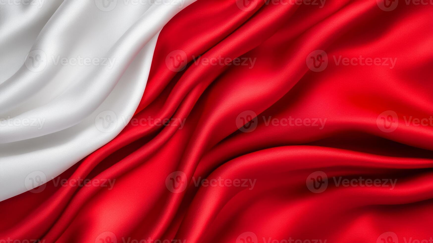 Soft red and white satin intertwined in smooth waves reflecting light elegant and abstract luxury background perfect for Christmas or Valentines Day festive mood photo