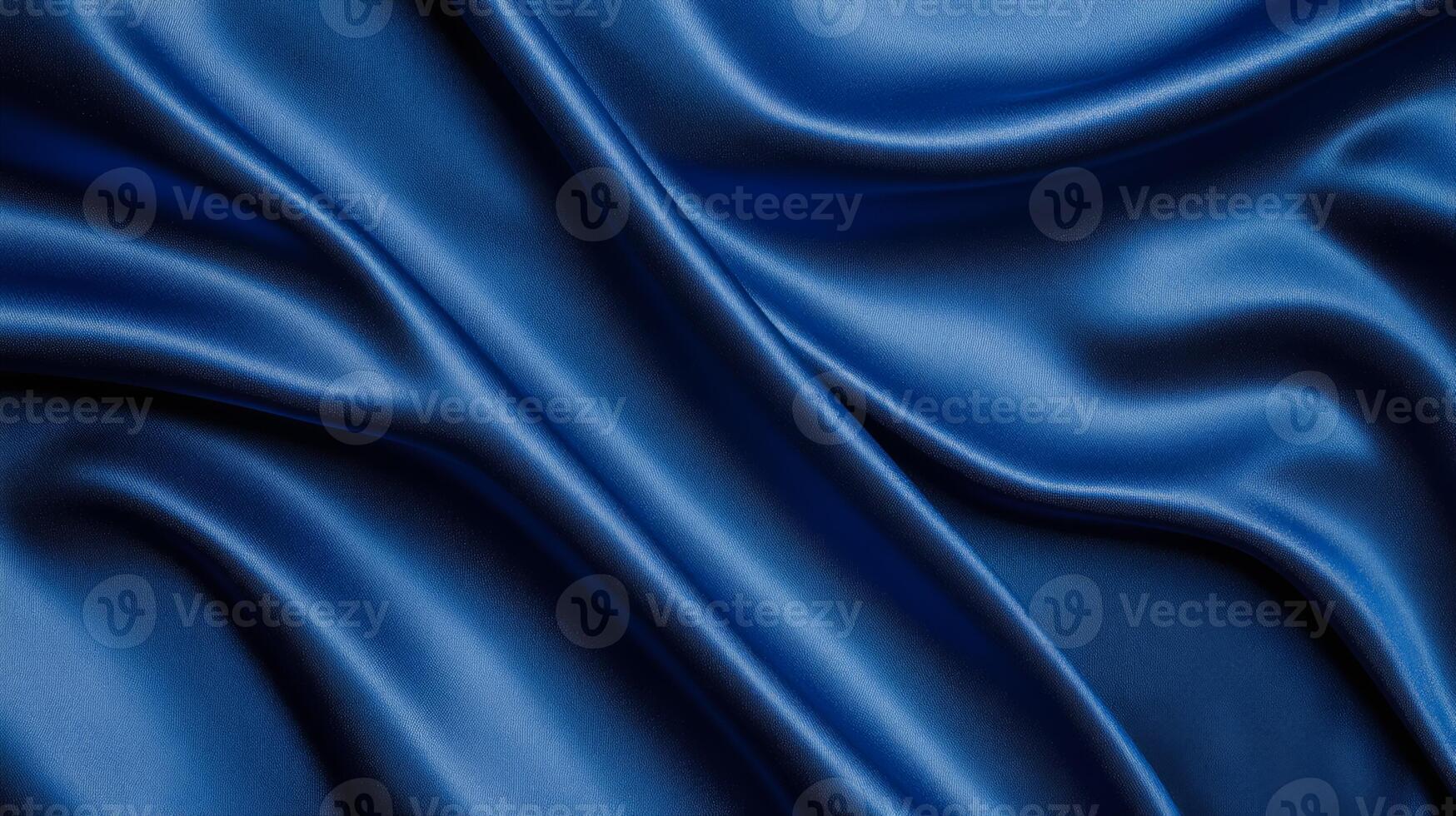 Soft royal blue velvet with flowing folds and a touch of silver luxurious abstract background ideal for New Years Eve themes elegant and festive texture photo