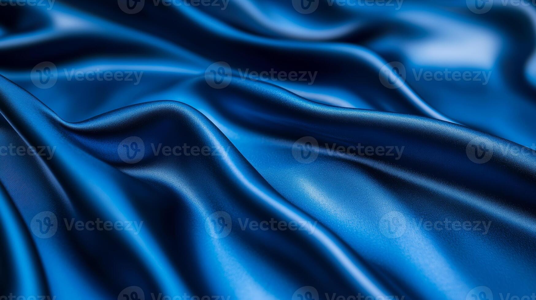 Soft royal blue velvet with flowing folds and a touch of silver luxurious abstract background ideal for New Years Eve themes elegant and festive texture photo
