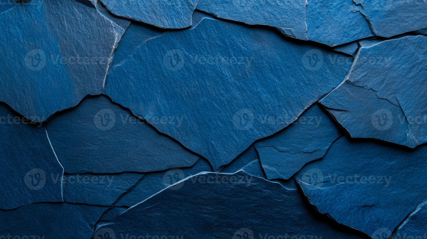 Textured stone surface in shades of deep blue and silver capturing Hanukkah spirit with subtle star engravings and rough grain adding a traditional festive touch photo
