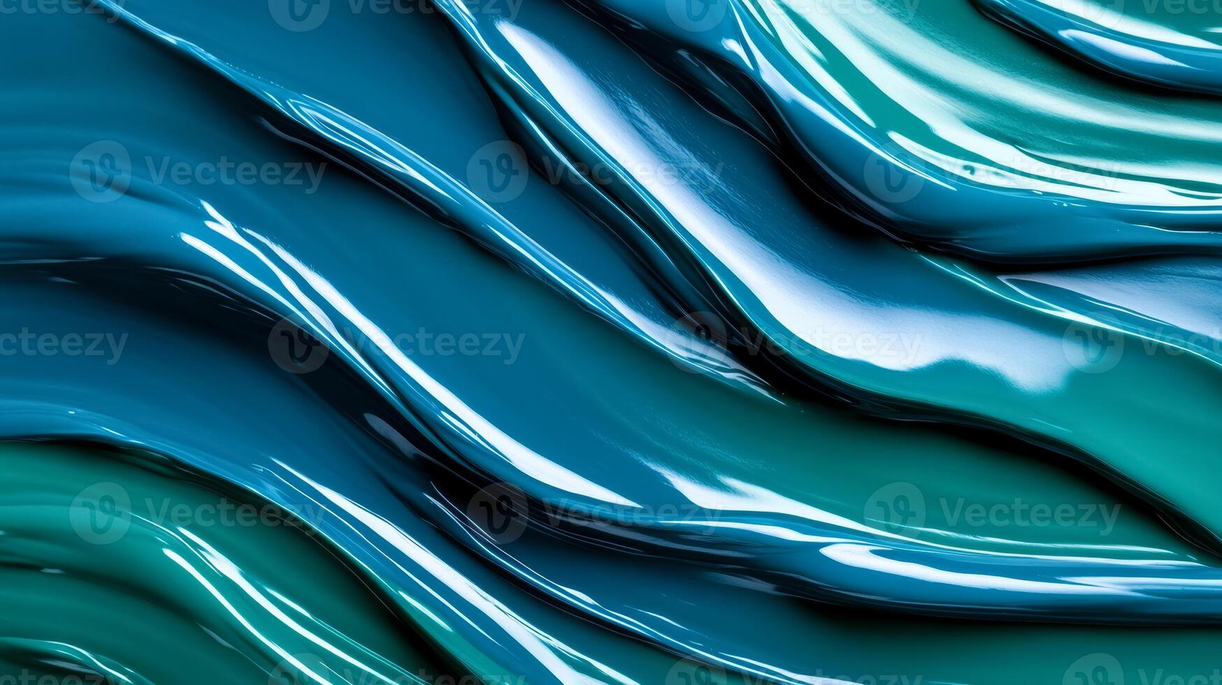 Close up of liquid waves in shades of cobalt and jade intertwining in a fluid dance photo