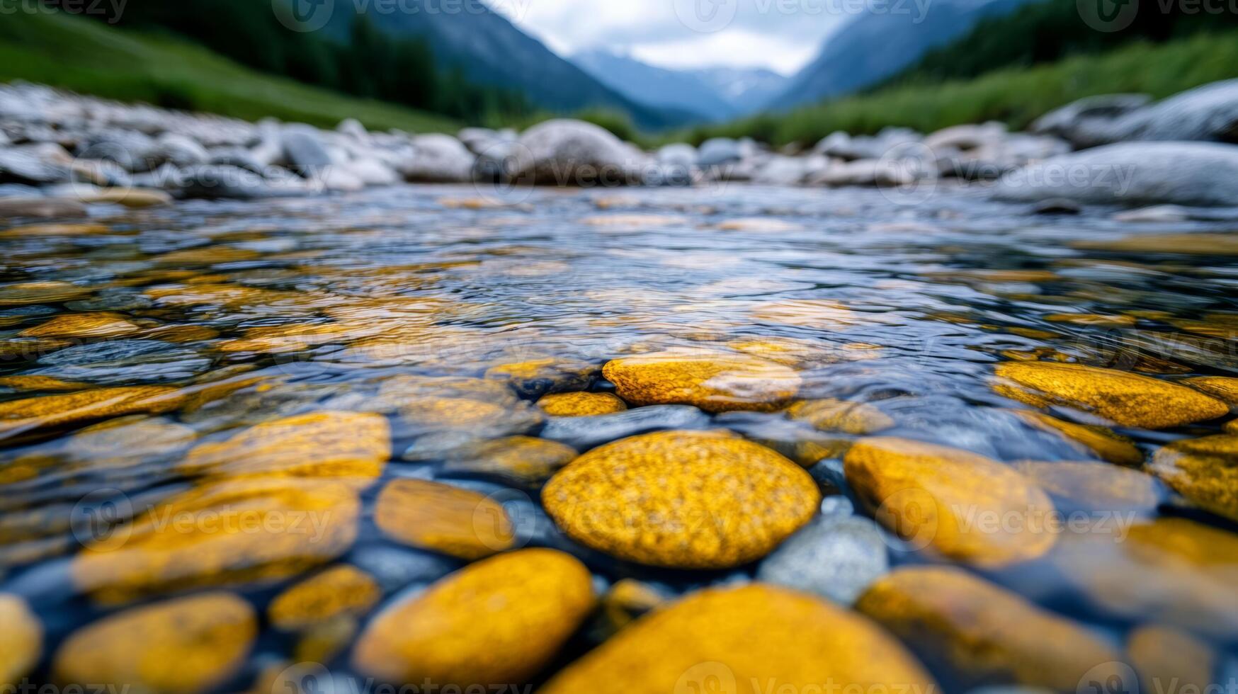 Close up of small whirlpools forming in a clear mountain stream photo