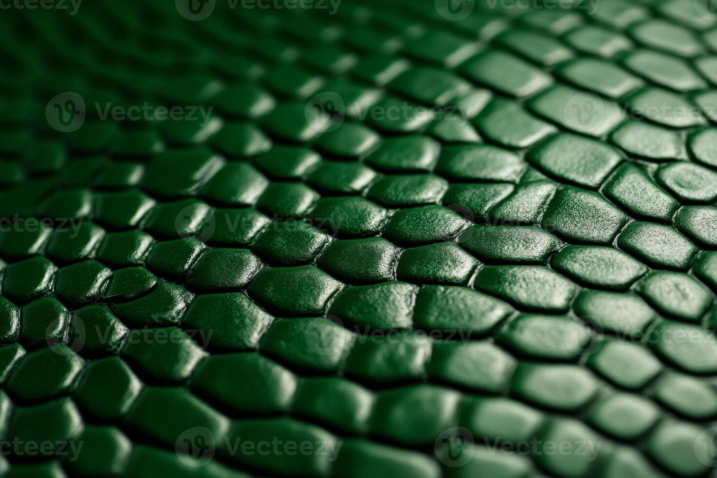Closeup of snake leather texture in dark green fine scales with subtle shine and intricate pattern photo