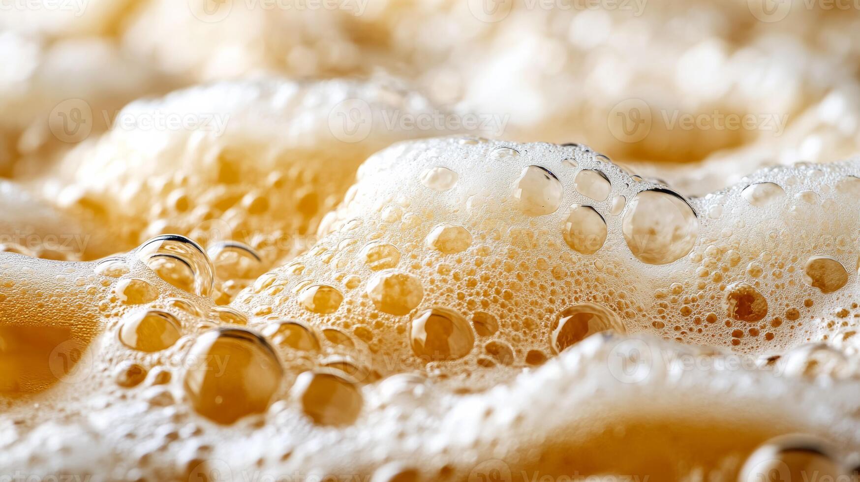 Detailed close up of an Oktoberfest beer stein overflowing with foam showing rich golden hues and bubbles photo