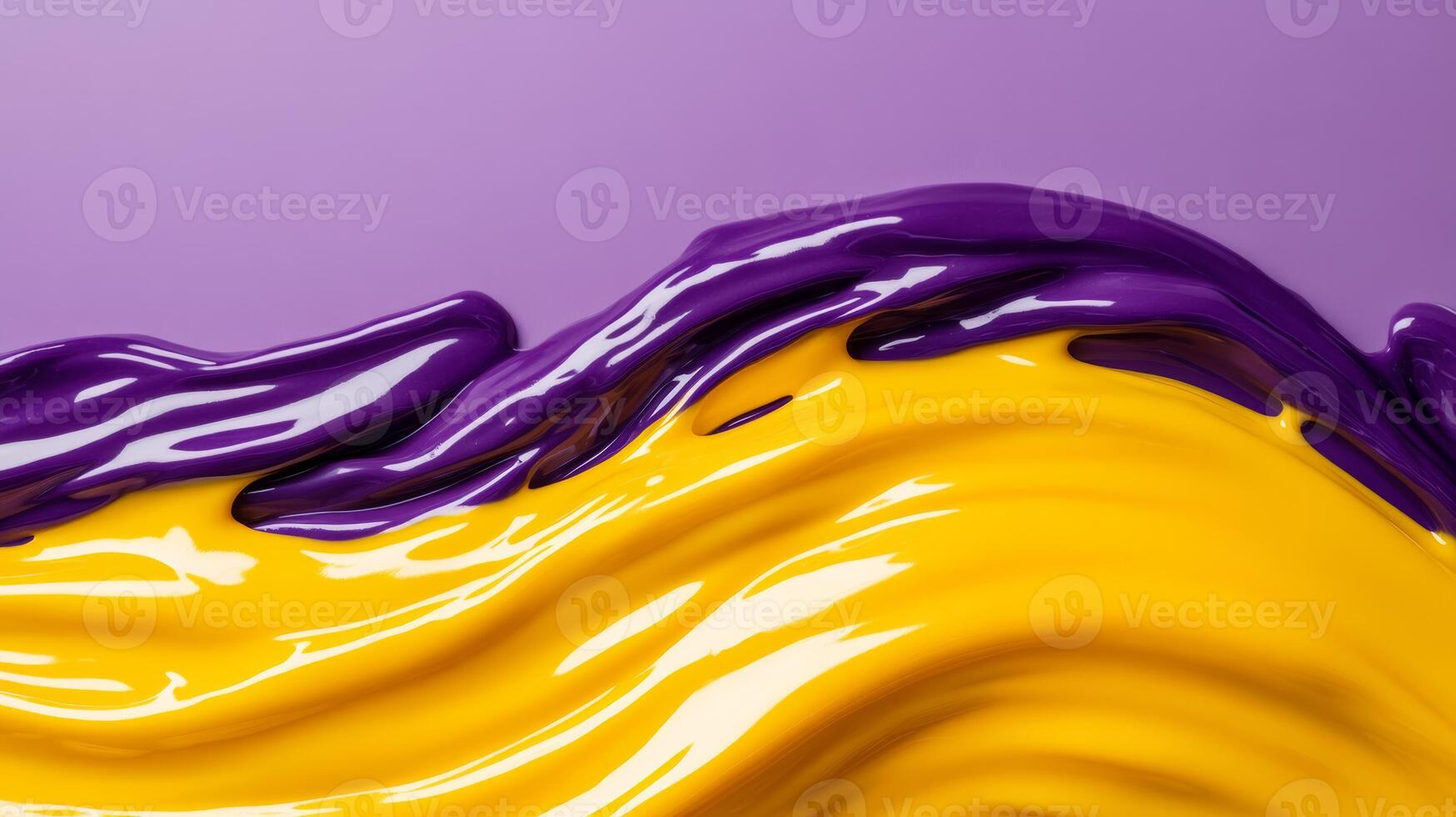 Macro image of liquid waves of yellow and purple intertwining with dynamic flow photo