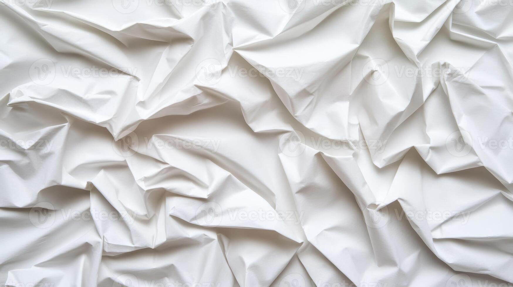 Softly crumpled paper background in light grey tones with subtle creases and folds for an organic texture photo