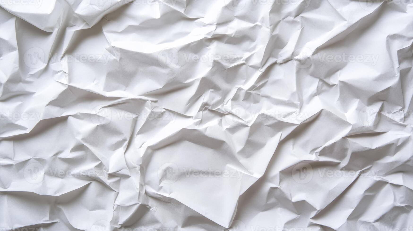 Softly crumpled paper background in light grey tones with subtle creases and folds for an organic texture photo