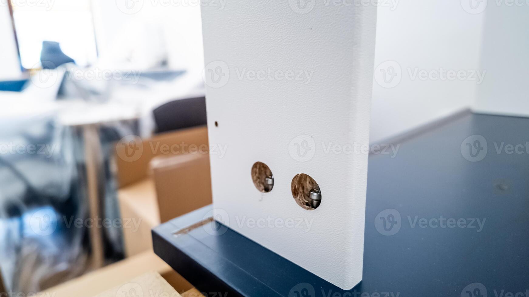 A close up of an unfinished DIY furniture piece assembly in a modern home setting highlighting home improvement and construction photo