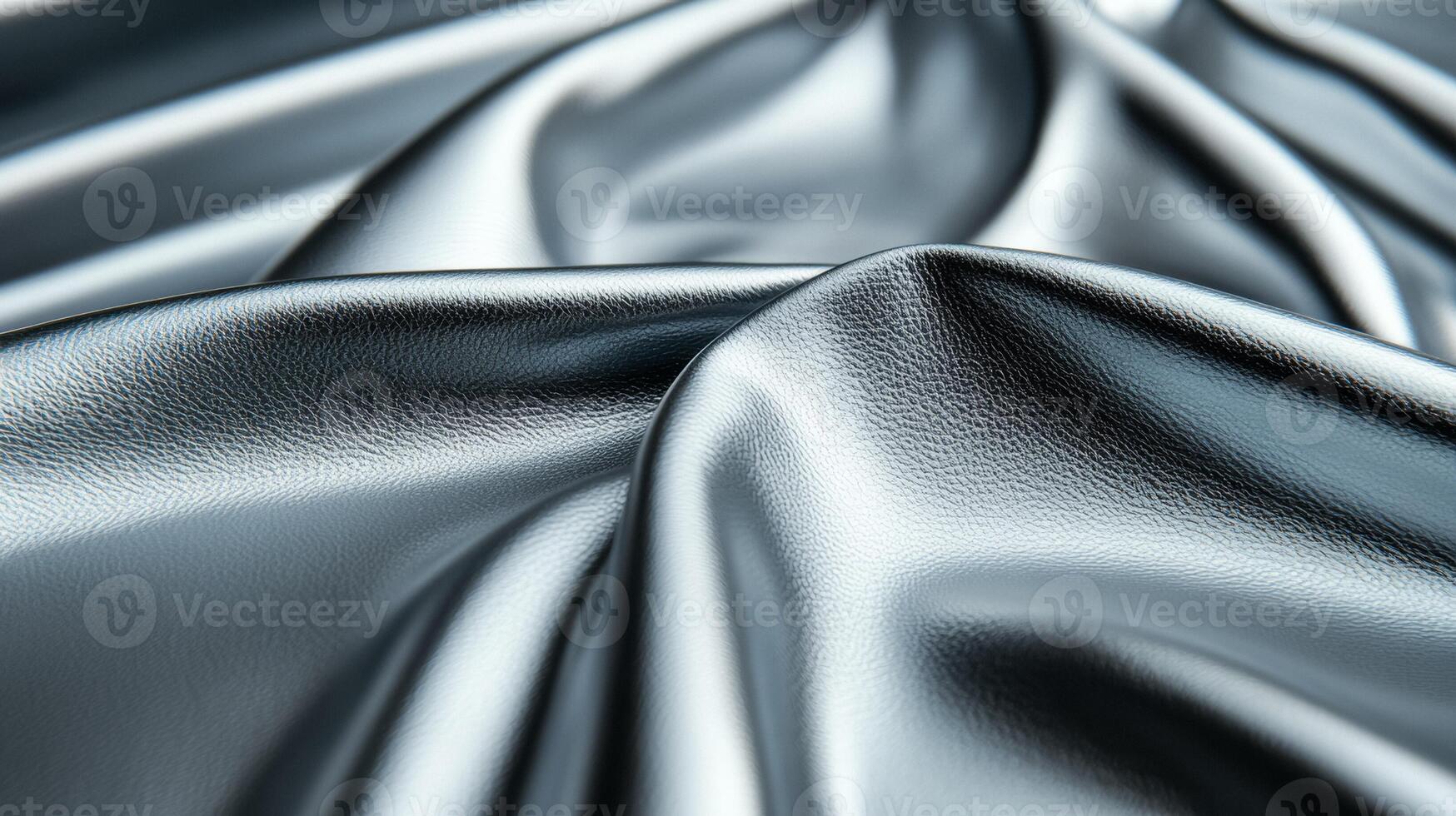 Closeup of metallic silver leather with a subtle shine and soft texture capturing light reflections delicately photo