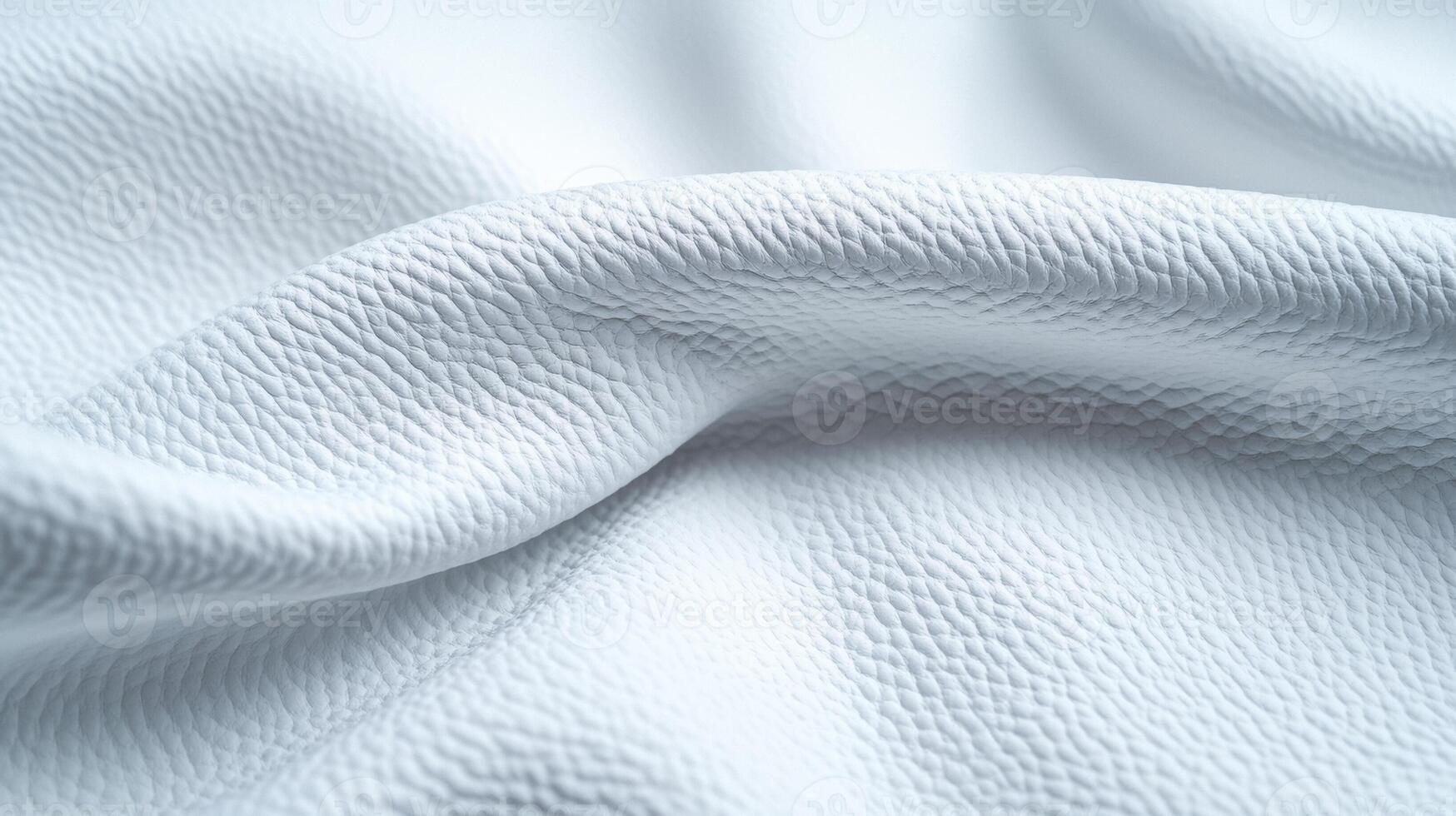 Closeup of muted winter grey leather with a fine grain and matte finish conveying the calmness of a snow covered field photo