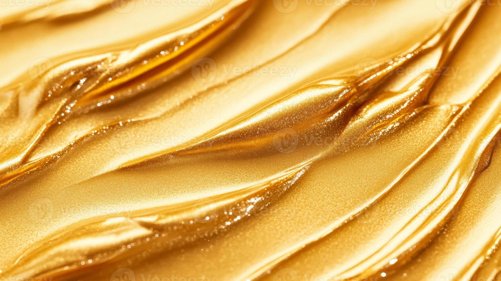 Closeup of golden highlighter cream texture with fine metallic flecks on a smooth surface luxurious beauty product detail photo