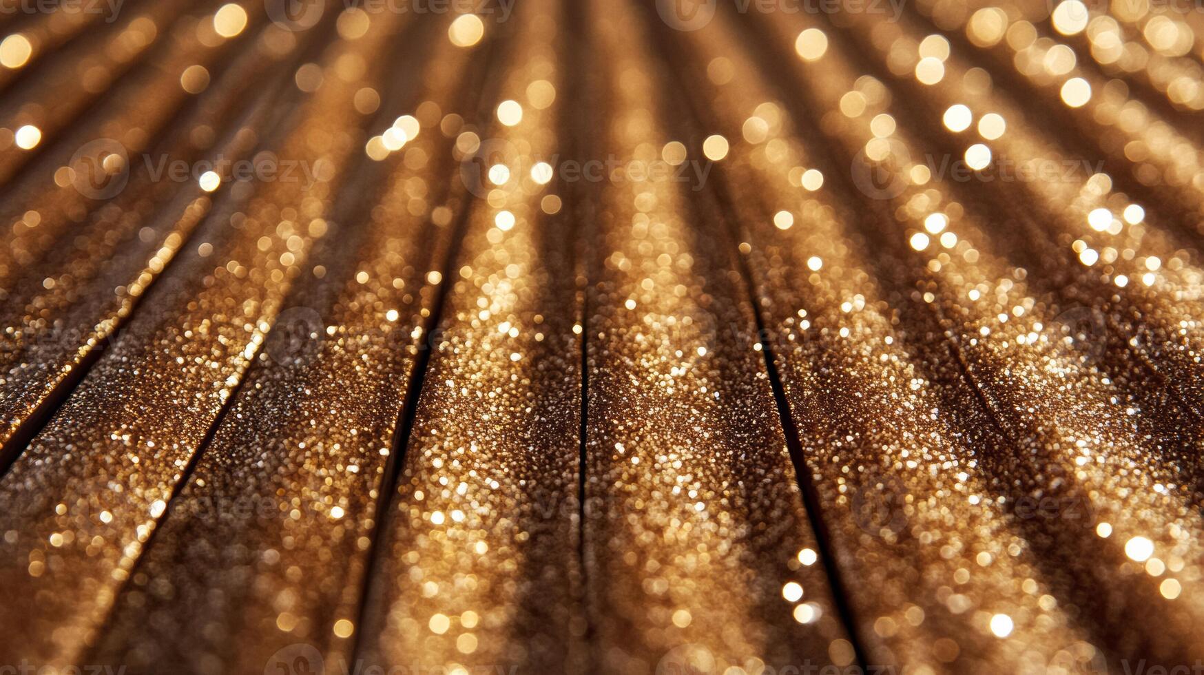 Glittering gold and amber highlighter cream with flecks of red and copper shining on a matte chocolate background photo