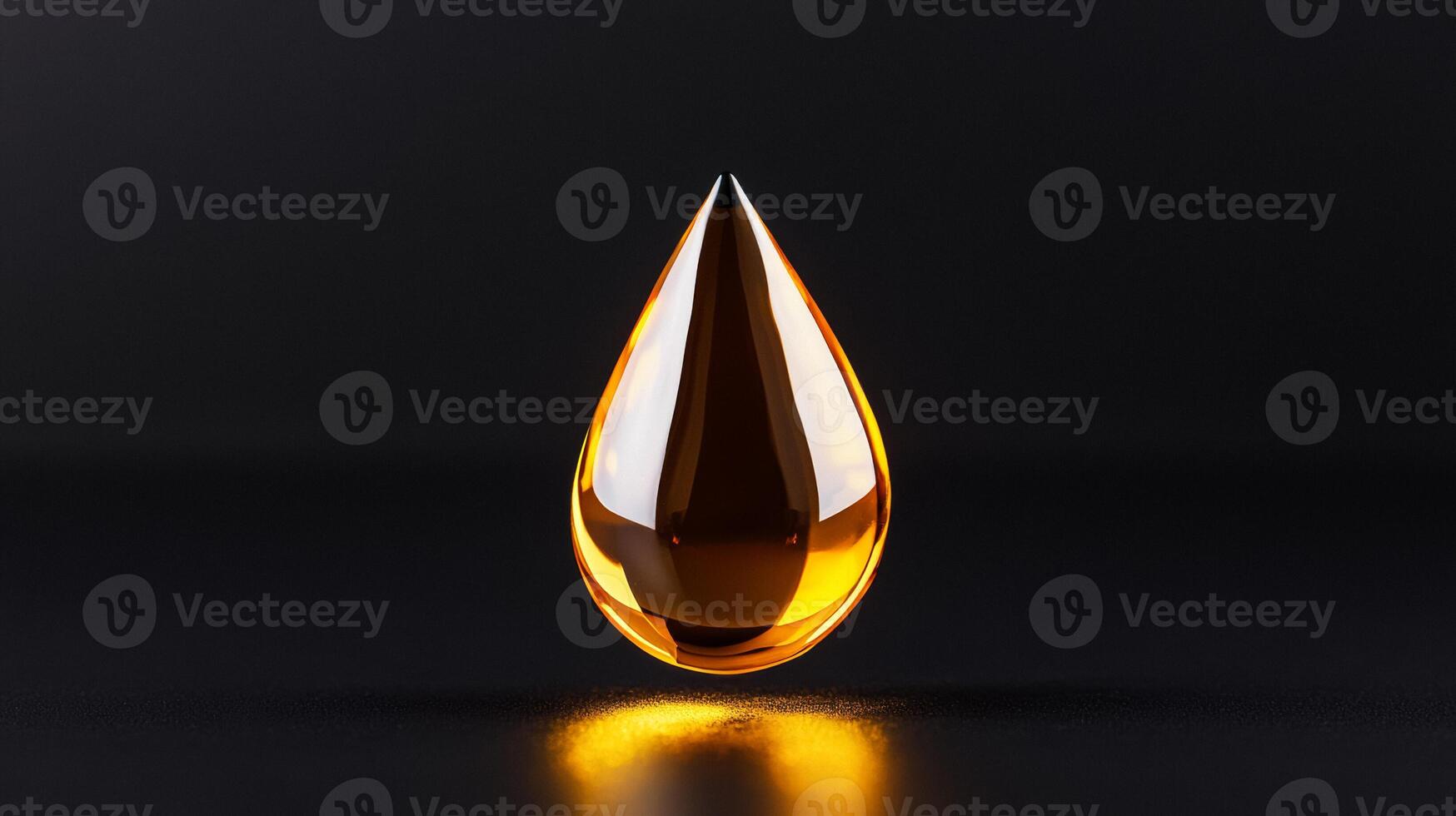 Golden facial oil drop glistening against a matte black background capturing light through its transparent form photo