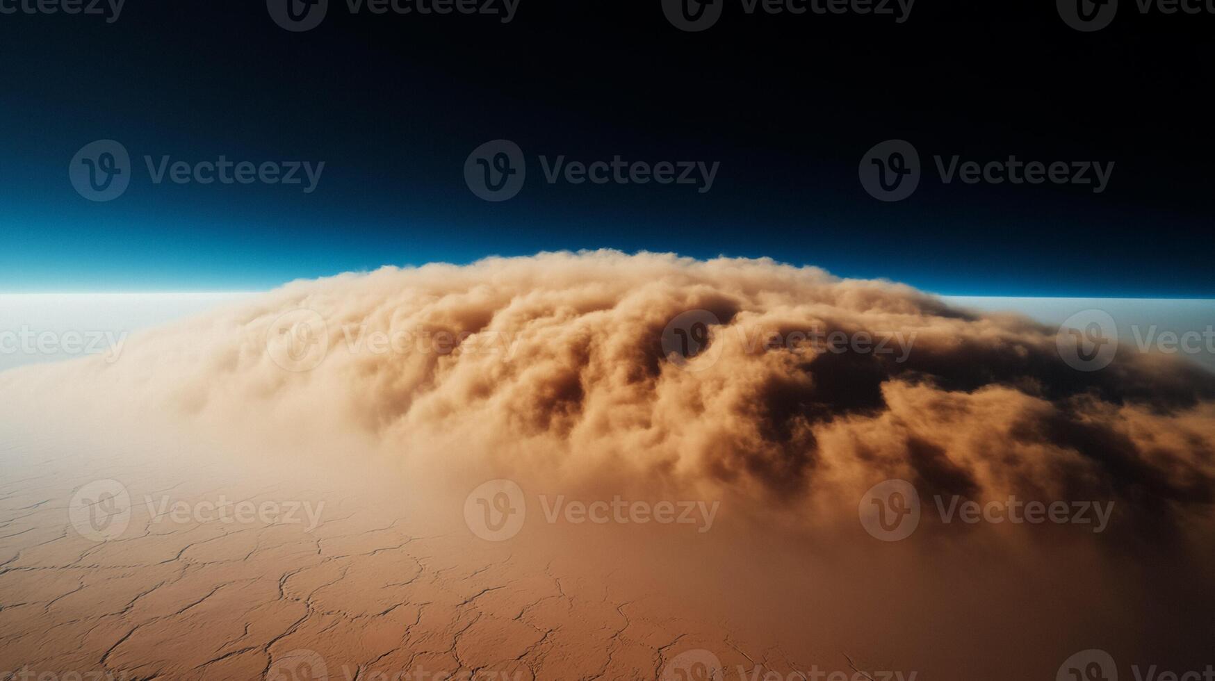 Huge dust storm crossing an arid desert from space view sandy haze moving across a stark barren landscape photo