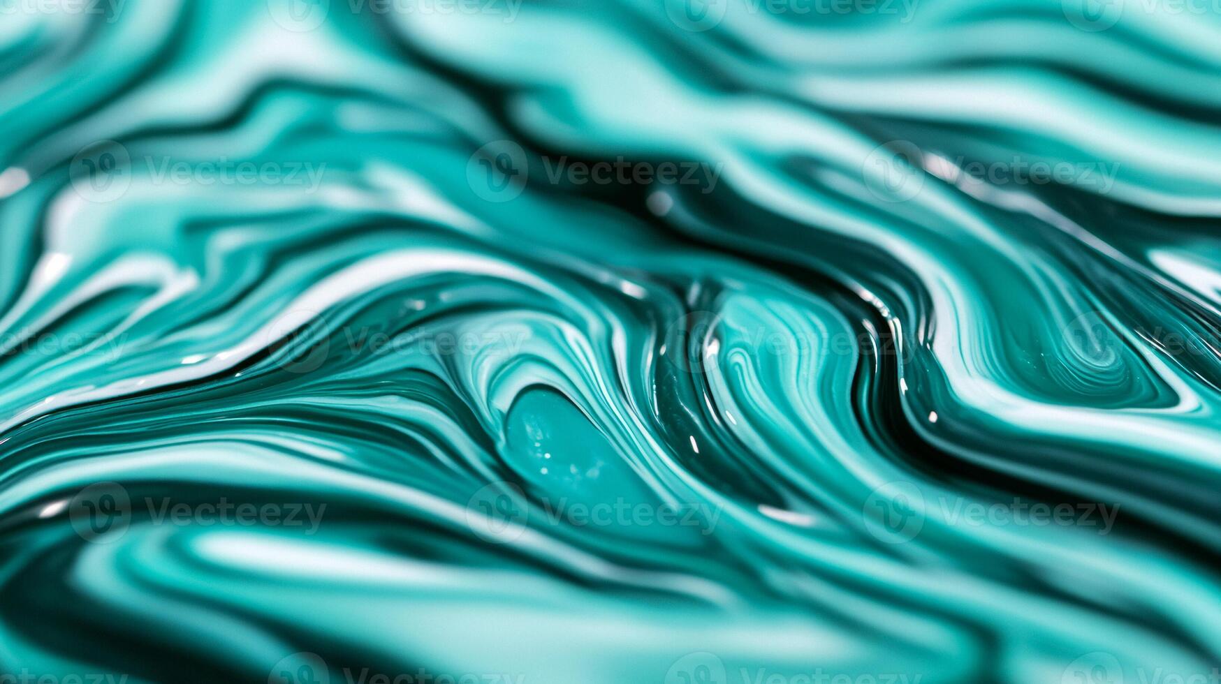 Macro shot of swirling blue and green marbled nail polish blending into fluid abstract waves with a glossy finish photo