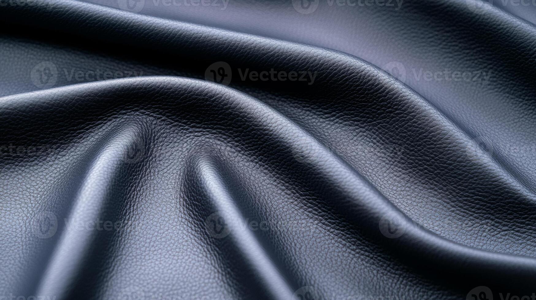 Macro shot of classic grey leather with natural creases and a matte texture giving a timeless look photo