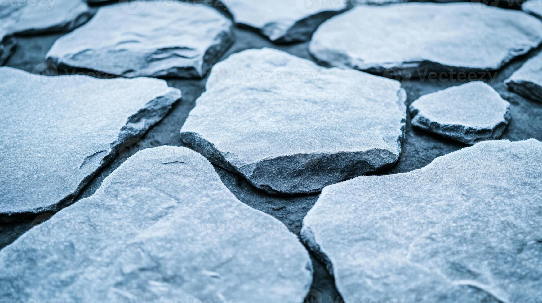 Macro view of glacier grey leather with a subtle metallic finish resembling snow covered rocks in winter photo