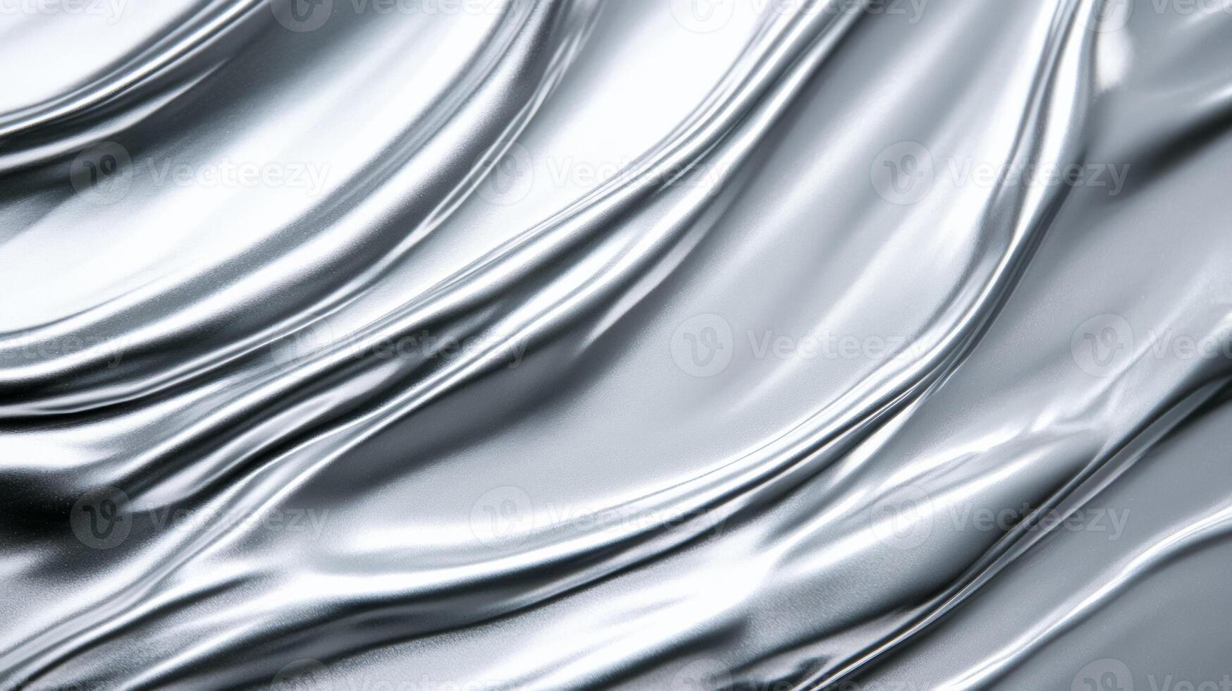 Pale silver grey lip gloss swirled with fine shimmer set against a cool metallic background photo