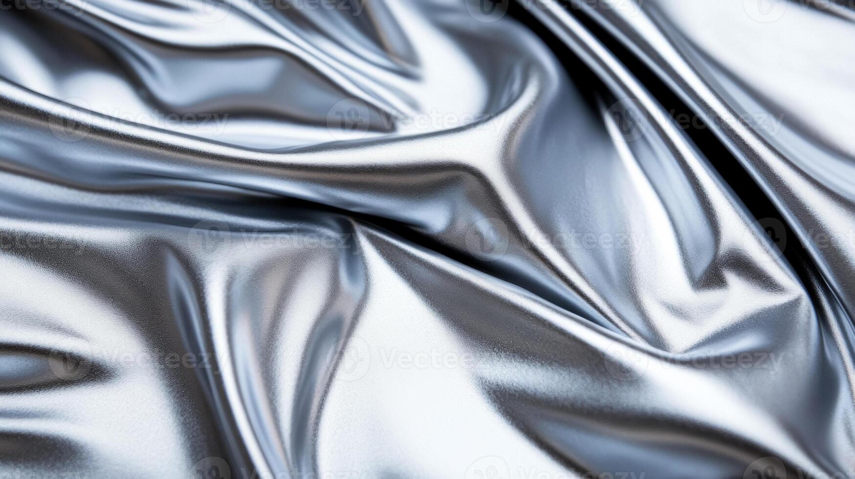Pale silver grey lip gloss swirled with fine shimmer set against a cool metallic background photo