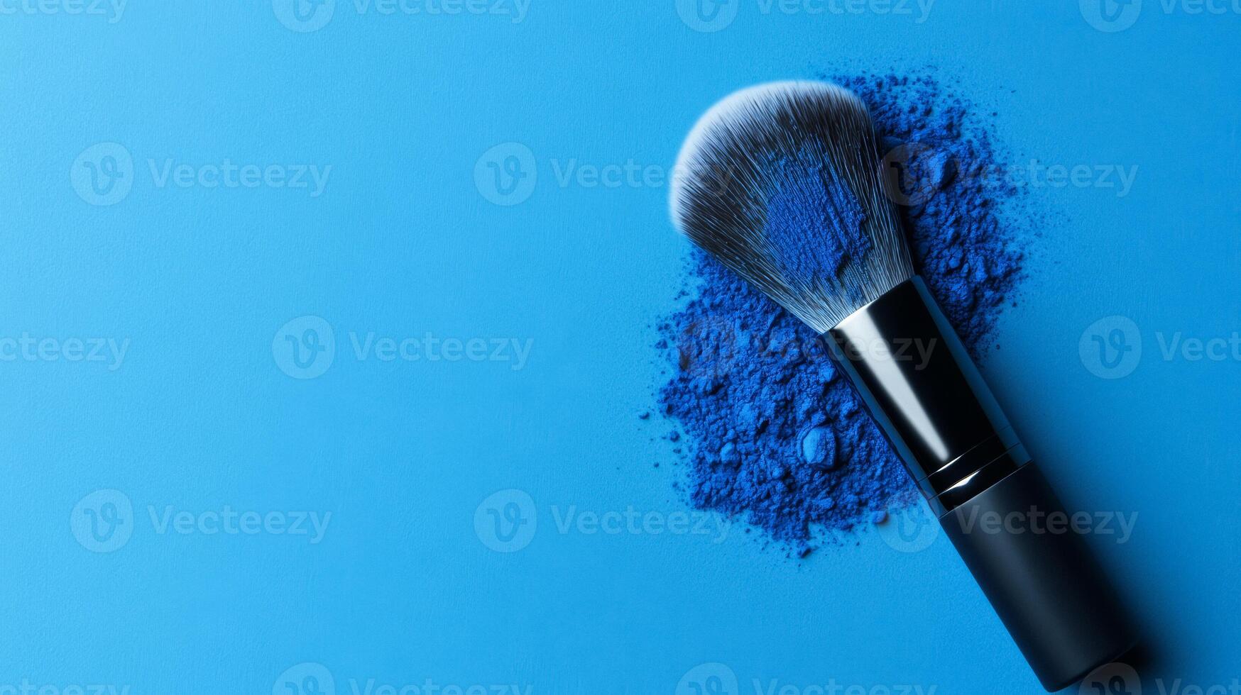 Satin finish translucent powder with soft shimmer spread on a dark blue gradient creating a celestial effect photo
