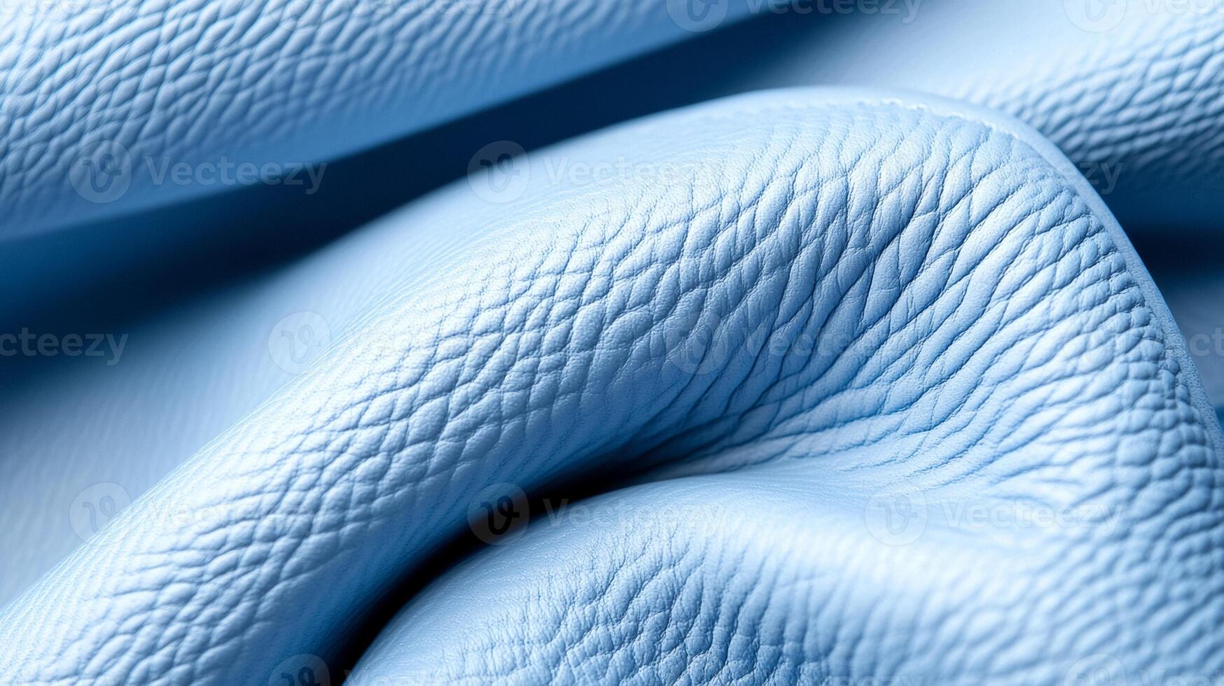 Soft powder blue leather with a fine grain and a smooth matte surface capturing the gentle hues of winter dawn photo