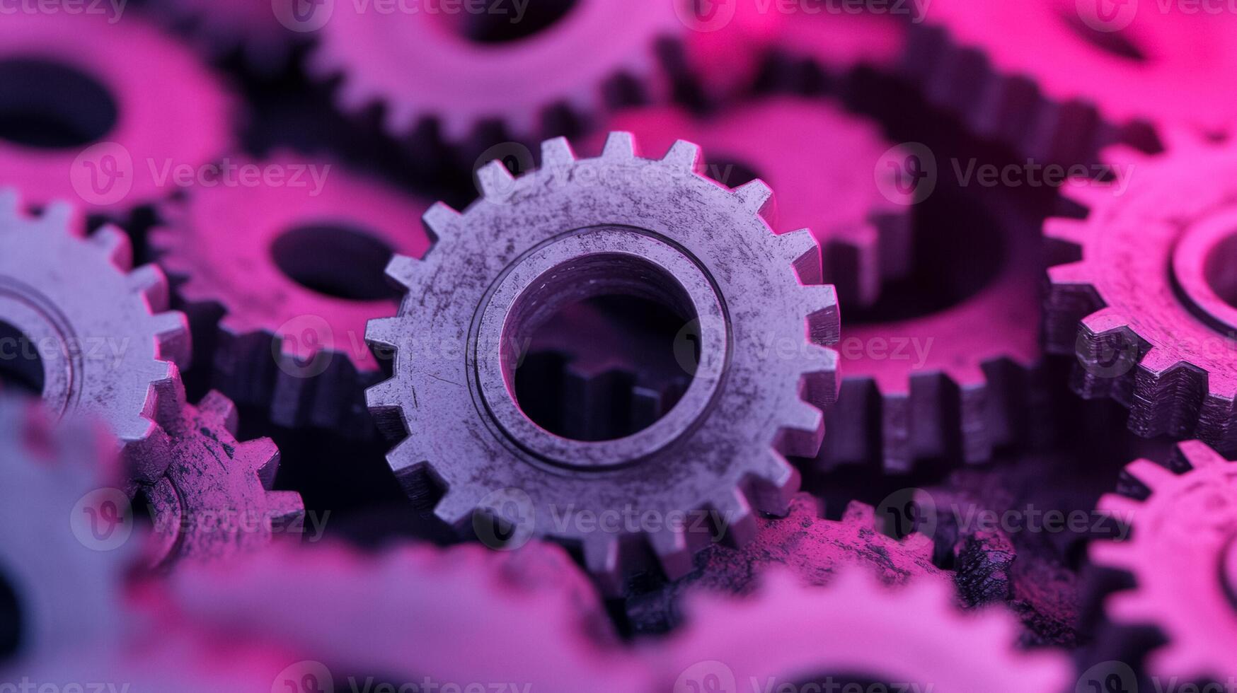 Steampunk gears turning against a gradient from rust to twilight purple suggesting the passage of time photo