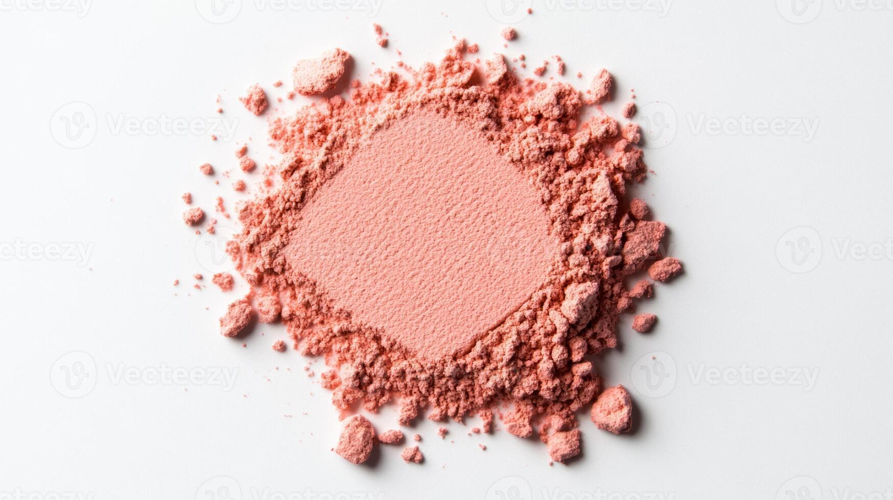Velvet soft blush powder puff with a hint of rosy pink pressed into a light dust cloud on a white surface photo