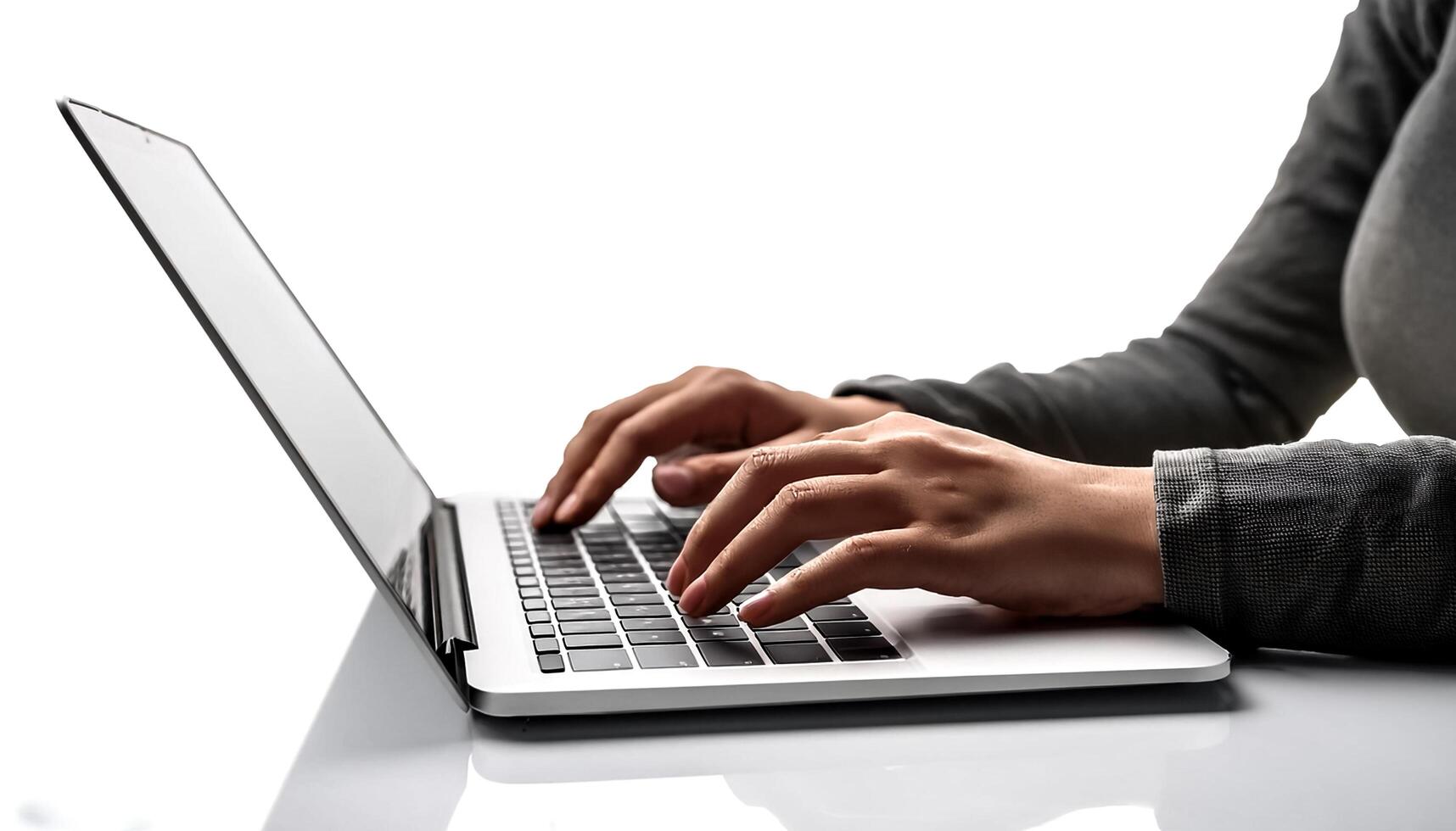 close up casual hand typing on laptop computer isolated on white background photo