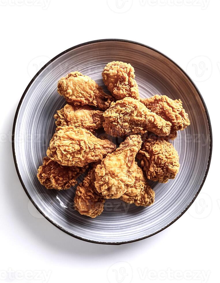 Fried chicken, isolated on white background photo