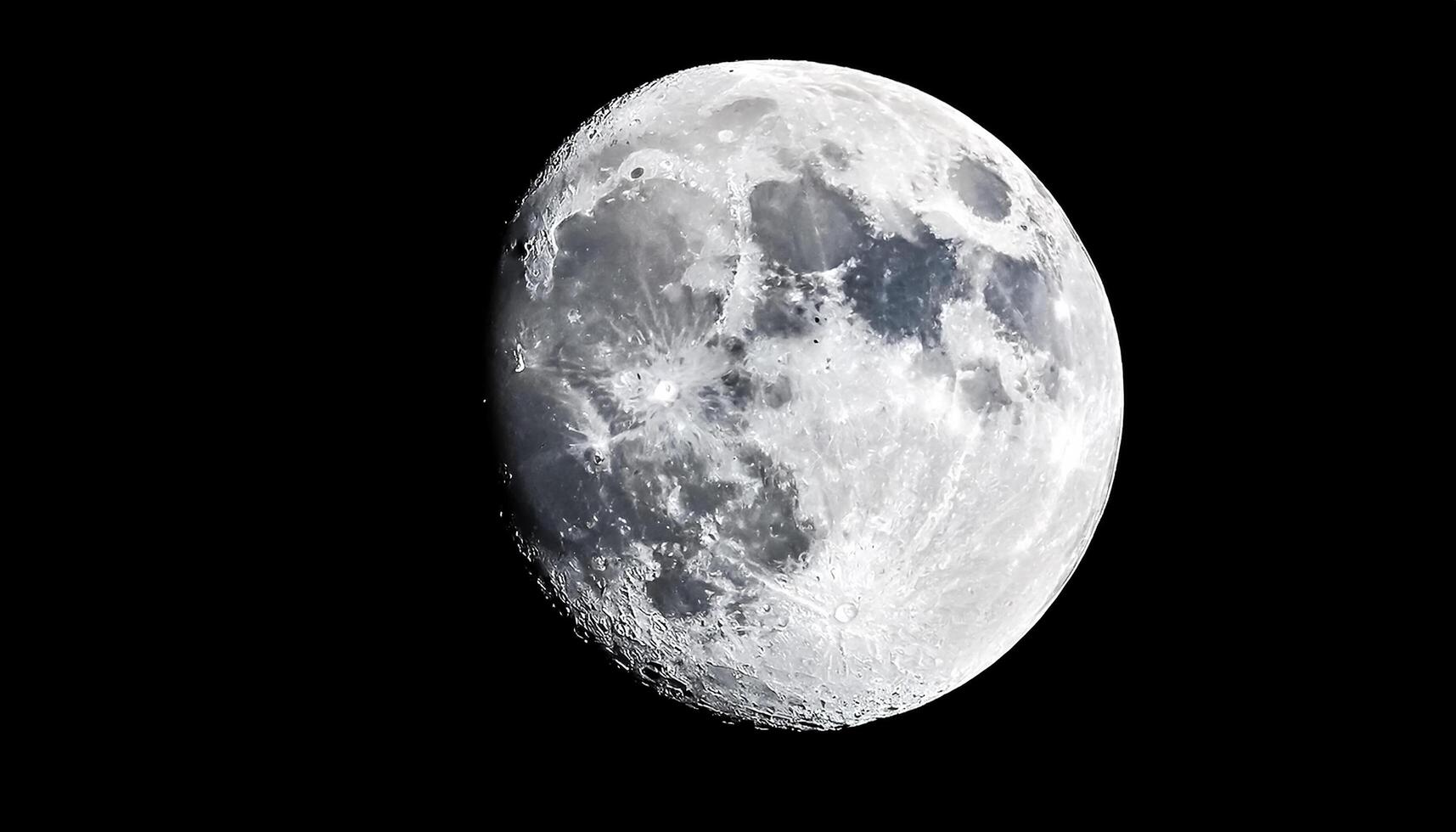 Closeup shot of the moon isolated on a black background photo