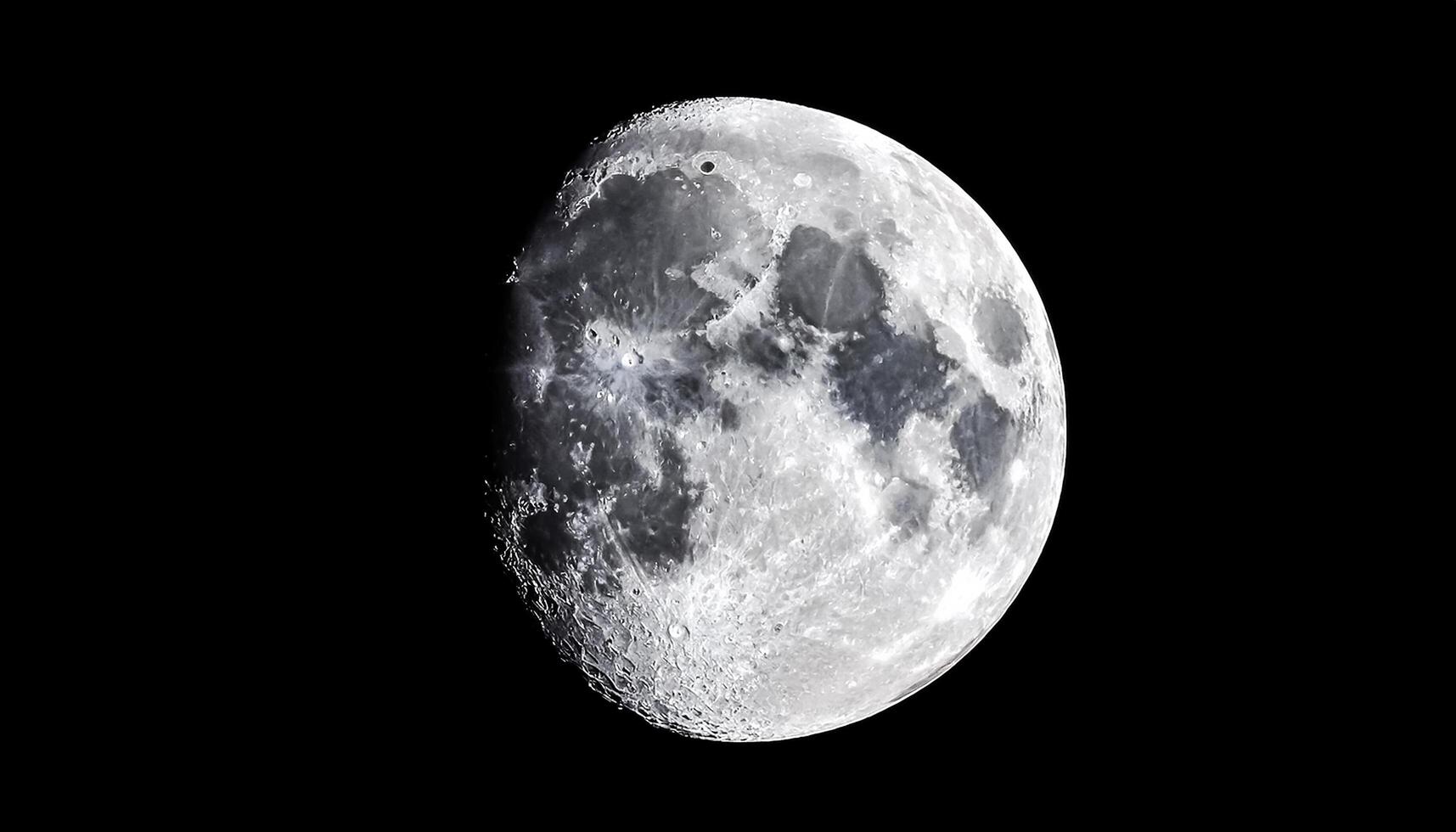 Closeup shot of the moon isolated on a black background photo