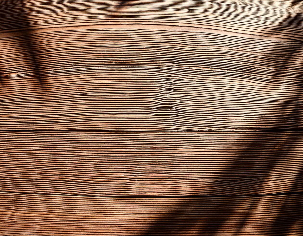 top view of soft brown table with high resolution texture and palm leafs shadows, summer table background with empty space for text or design, soft cozy sunny table backdrop, wooden texture seamless photo