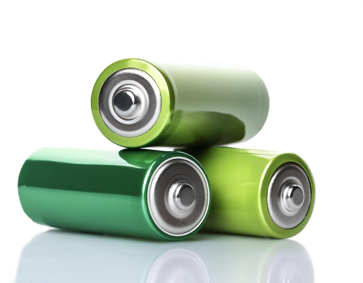 Three batteries, isolated on white background photo