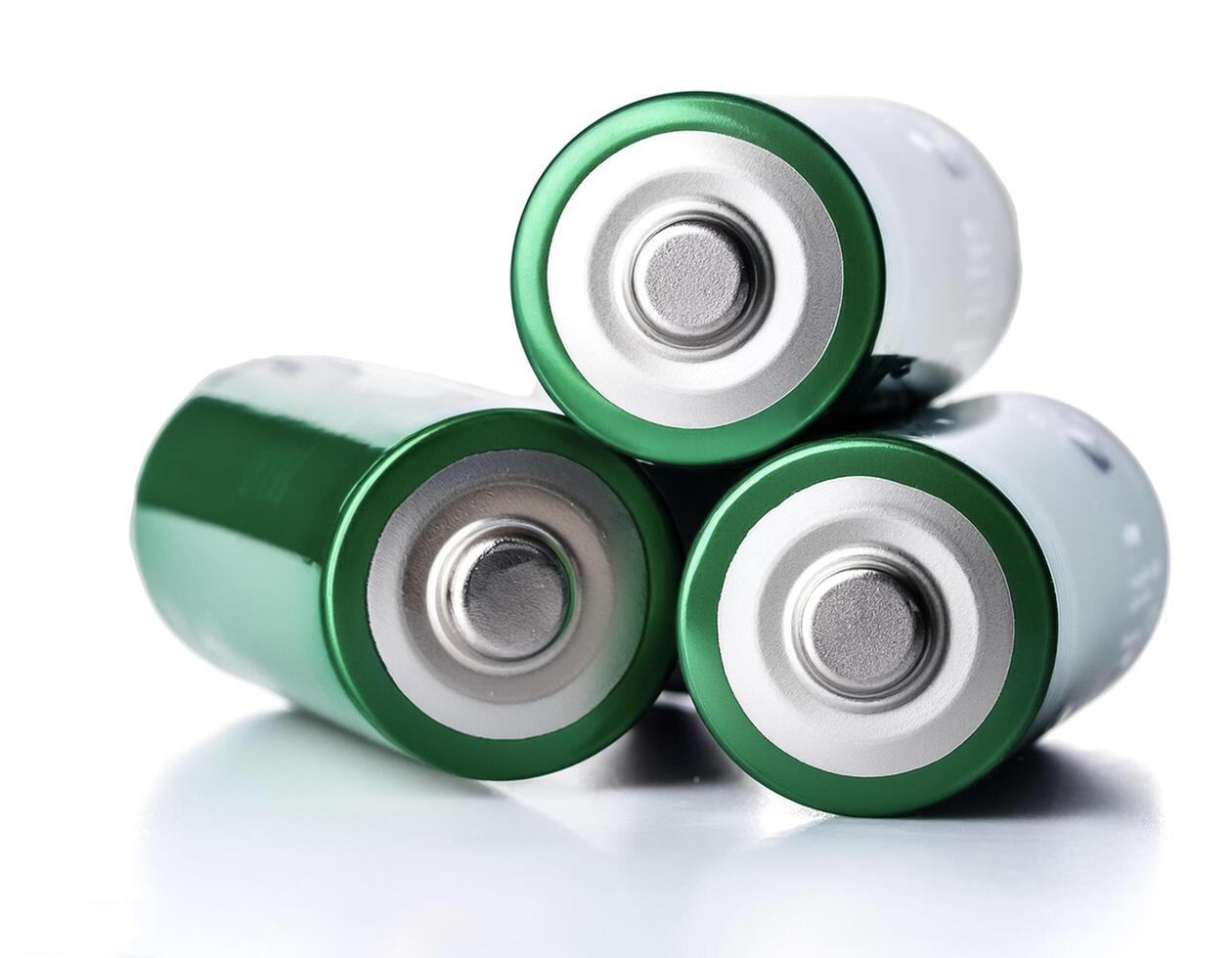 Three batteries, isolated on white background photo