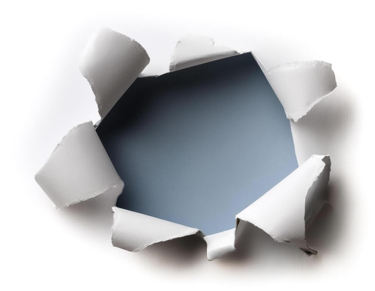 a white paper hole torn photo