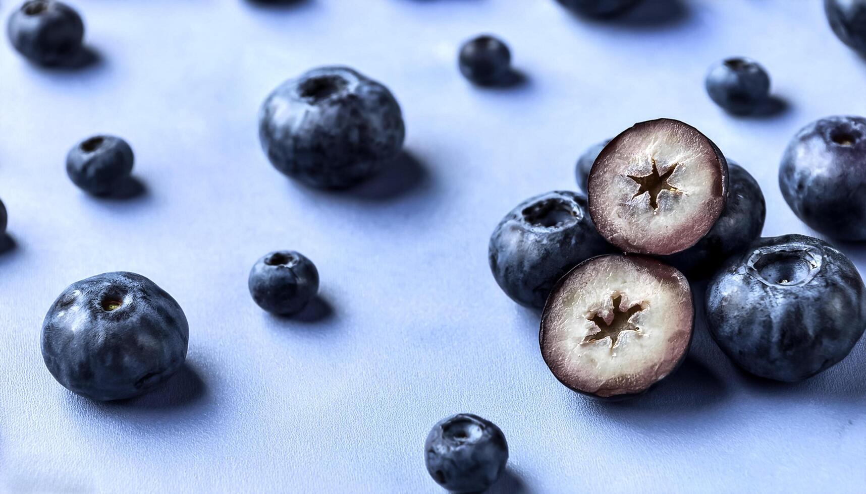 Overhead view of Fresh, Ripe and juicy blueberries. Halves food summer background photo