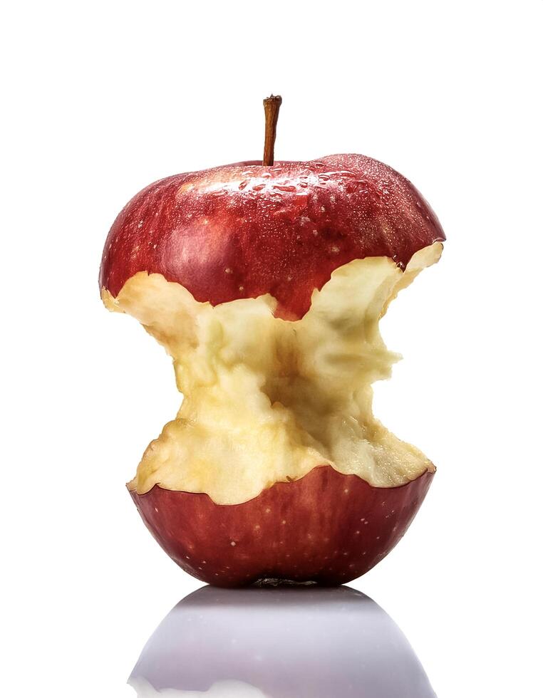bitten red apple isolated on white background photo
