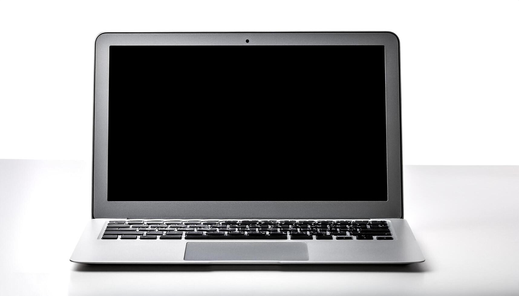 laptop with black screen isolated on white background photo