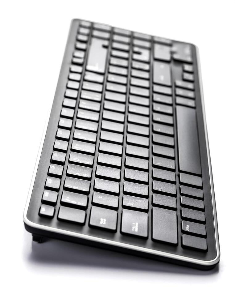 computer keyboard isolated on white background photo