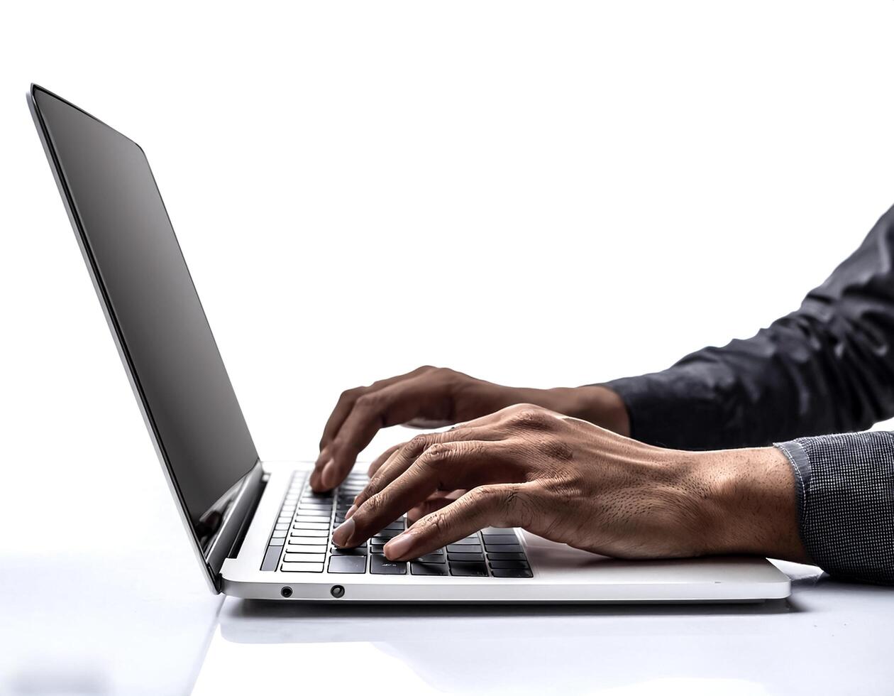 close up casual hand typing on laptop computer isolated on white background photo
