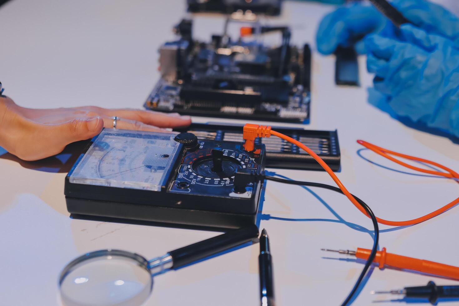 Electronics technician, electronic engineering electronic repair, electronics measuring and testing, repair and maintenance concepts. photo