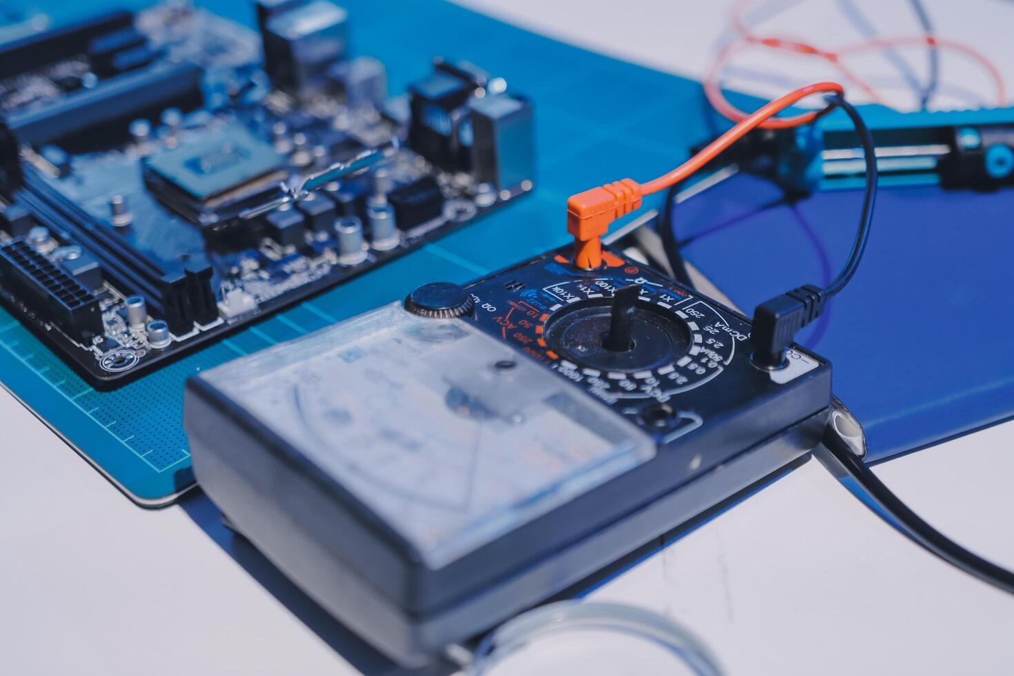 Electronics technician, electronic engineering electronic repair, electronics measuring and testing, repair and maintenance concepts. photo