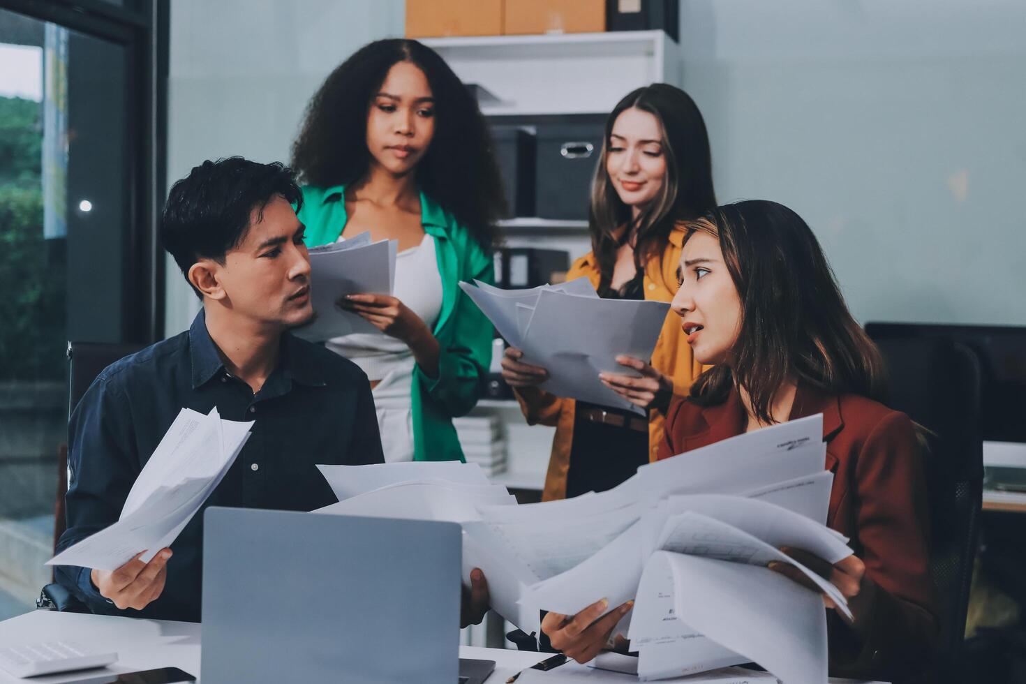 Stress, business people and employee frustrated with multitasking, pressure or overworked by team in chaos with paperwork. Anxiety, headache and worker overwhelmed by group and burnout in crisis photo