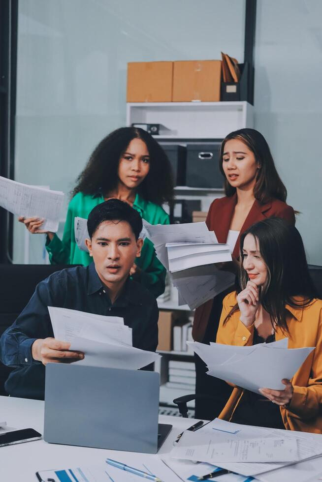 Stress, business people and employee frustrated with multitasking, pressure or overworked by team in chaos with paperwork. Anxiety, headache and worker overwhelmed by group and burnout in crisis photo
