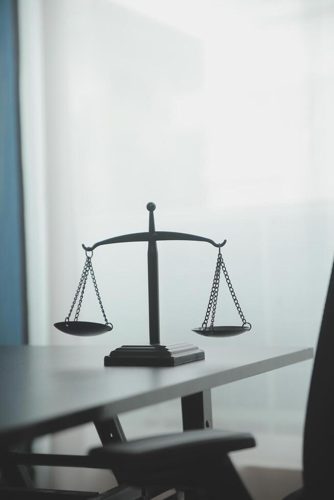 Law theme, gavel or mallet of the judge, lawyer enforcement officers, evidence-based cases taken into account in the court abount business, legislation. photo