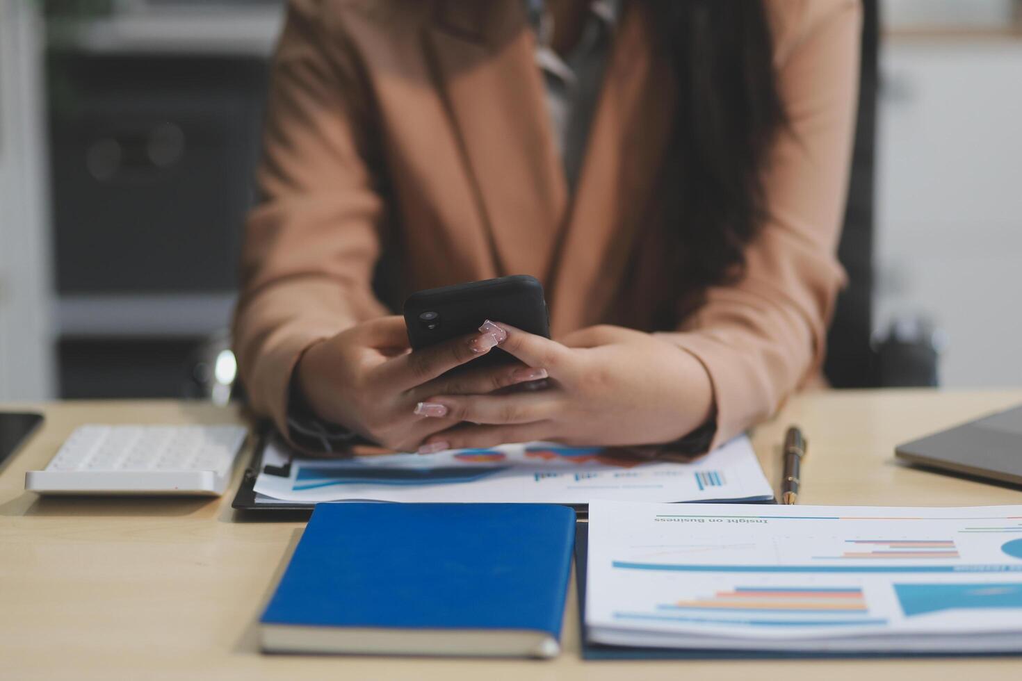 business documents businessman check legal document review Prepare documents or analysis reports, tax items, accounting documents, data contracts, office partner agreements. photo